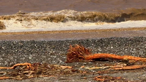 Aftermath Of A Heavy Rain And Storm On A Pebble Beach Stock Footage 317820609