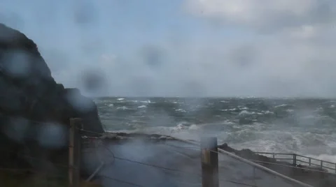 Aftermath of Hurricane Gonzalo- wind causes water to run along pavement Stock Footage 42899112