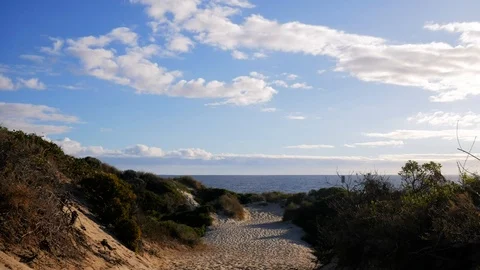 Afternoon clouds moving at beach time-lapse Vídeo Stock 108379013