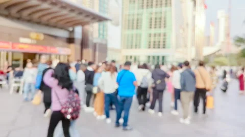 Afternoon Rush in Soft Focus: Landmark Scene with Blurred Human Motion Stock Footage 313107429