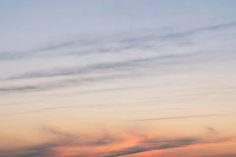 Afternoon sunset with soft clouds over the sky Stock Photos