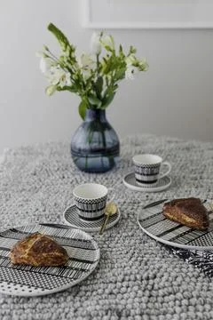 Afternoon tea time with modern patterned tableware tea set Stock Photos
