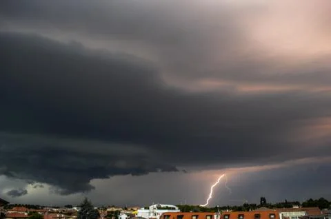 Afternoon thunderstorm timelapse with lightning Stock Photos