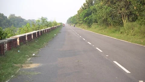 In the afternoon while driving a vehicle on an open straight road 動画素材 217533848
