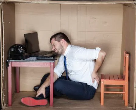 Again the pain in the back Stock Photos
