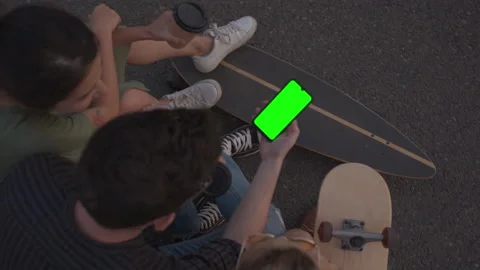 Again together. Green screen. Multiracial Friends sit together after a long Stock Footage 154177562