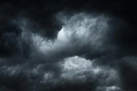 Against a backdrop of dark storm clouds. Stock Photos