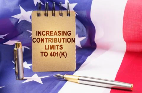 Against the background of the American flag is a notepad with the inscription Stock Photos