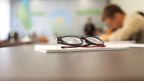 Against the background of glasses, the presentation of the project in the office Stock Footage 80678287