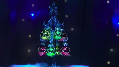 Against the background a small Christmas tree Stock Footage 143445079