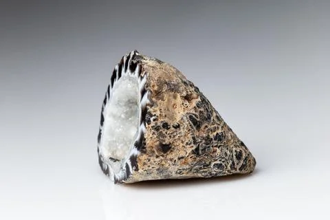 Agate Geode with Hyaline Quartz on Grey Background Stock Photos