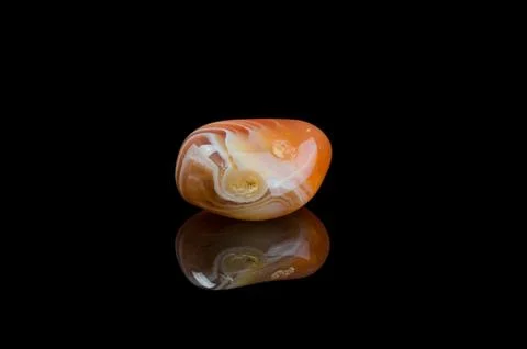 Agate isolated black background with mirror reflection Foto stock