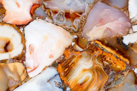 Agate slab texture with shiny surface in brown tone. Stock Photos