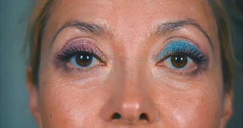 Age makeup. Applying powder to the face with a large fluffy brush Stock Footage 284266589