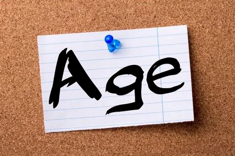 Age - teared note paper pinned on bulletin board Stock Photos