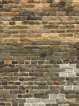 Aged brick wall with weathered texture Stock Photos