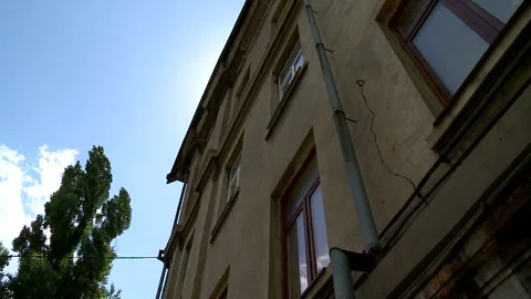 Aged building facade with windows in old historical town, loneliness Stock Footage 90706616