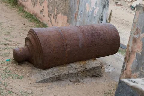 Aged Cannon on Weathered Base Stock Photos