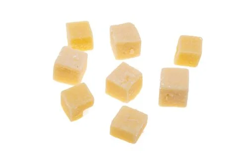 Aged cheese cubes isolated Stock Photos