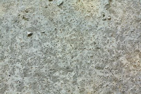 Aged concrete texture with rough surface and small cavities Stock Photos