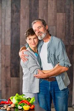 Aged couple in the kitchen Stock Photos