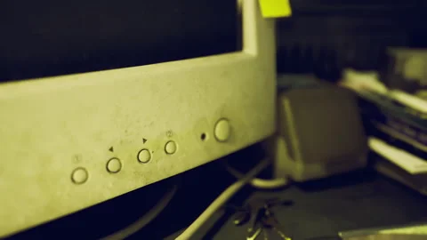 Aged CRT screen showing control buttons and yellowed bezel surface Stock Footage 342438145