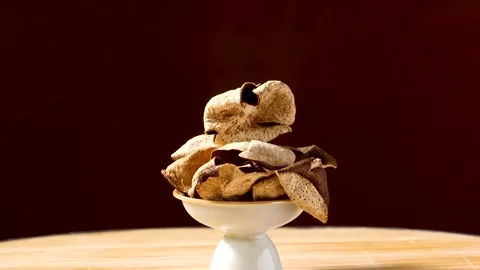 Aged Dried Tangerine Peel Chenpi Still Life on Ceramic Dish Stock Footage 340451978