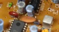 Aged Electronic Board Capacitors Vintage Tech Components Mounted Old Motherboard HD Footage