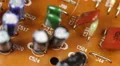 Aged Electronic Components Outdated Brown Board Closeup Old Circuits Background HD Footage