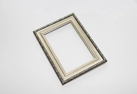 Aged frame for a photo, picture or certificate. Photo on a white background. Stock Photos