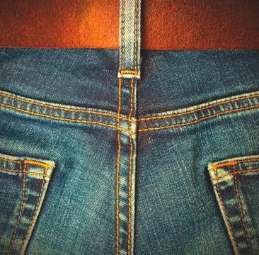 Aged jeans, back view Stock Photos