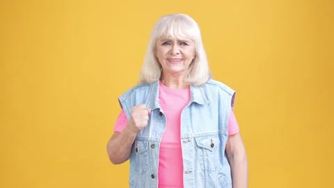 Aged lady moving want do something isolated shine color background Stock Footage 189783683