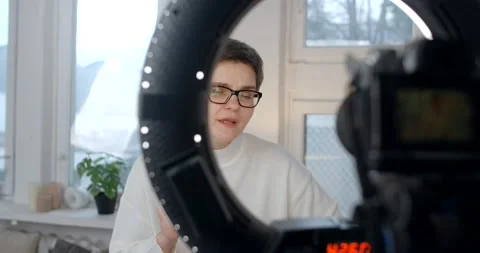 Aged lady records talking video in studio Stock Footage 238768366