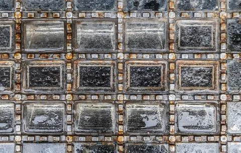Aged light window in rusty metal frame abstract background Stock Photos