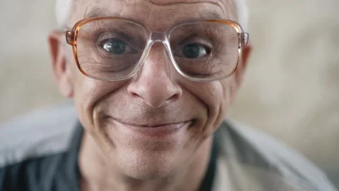 Aged man making funny face Stock Footage 150804570