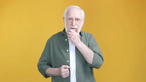 Aged man remember memory great mind suggestion isolated bright color background Stock Footage 196089393