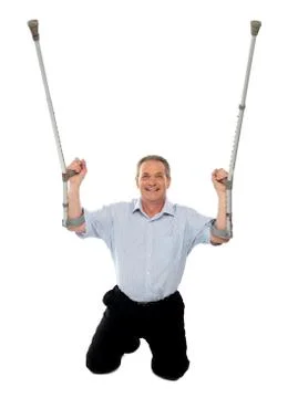 Aged man thanking God while recovering from injury Stock Photos