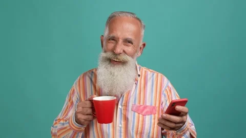 Aged man use device search sale drink beverage isolated cyan color background Stock Footage 166690394