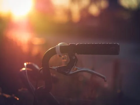 Aged Old Bicycle Handlebar in Backlight Stock Photos