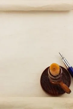 Aged parchment scroll as background Stock Photos