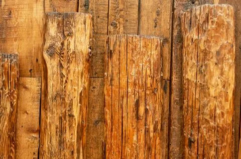 Aged planed wood. The beam under the nail. The loft-style, rustic. exture Stock Photos