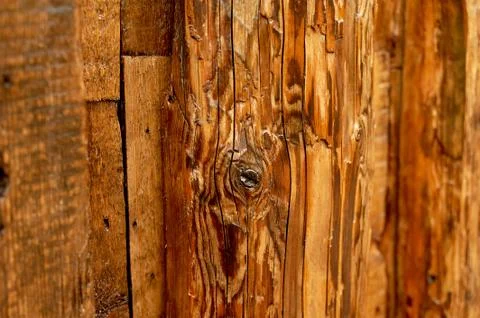 Aged planed wood. The beam under the nail. The loft-style, rustic. exture Stock Photos