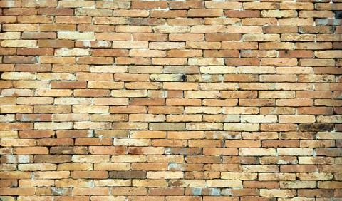 Aged red brick wall texture background, vintage masonry pattern wallpaper. Stock Photos