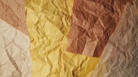 Aged, rough, and textured sheets of kraft paper in natural brown, beige. Stock-Footage 330261570