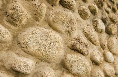 Aged stone wall texture of old medieval castle. 스톡 사진