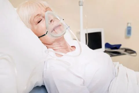 Aged tender lady having problems with her lungs 스톡 사진