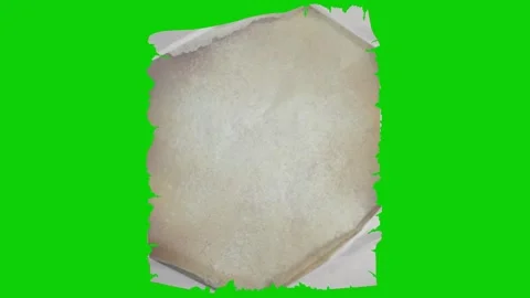 An aged torn paper opens up then crumples again revealing vintage details. 動画素材 320990260