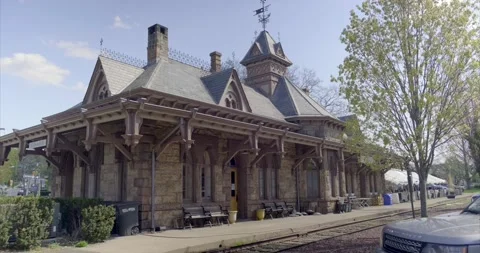 Aged Train Station now converted to Cafe Angelique, Tenafly. 4K Stock Footage 152846809