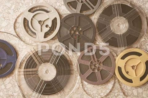 Aged vintage super 8 mm film reels background Stock Photos