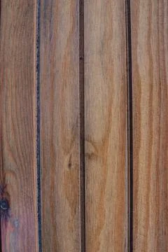 Aged wooden panel texture background with vertical grooves natural brown ti.. Stock Photos
